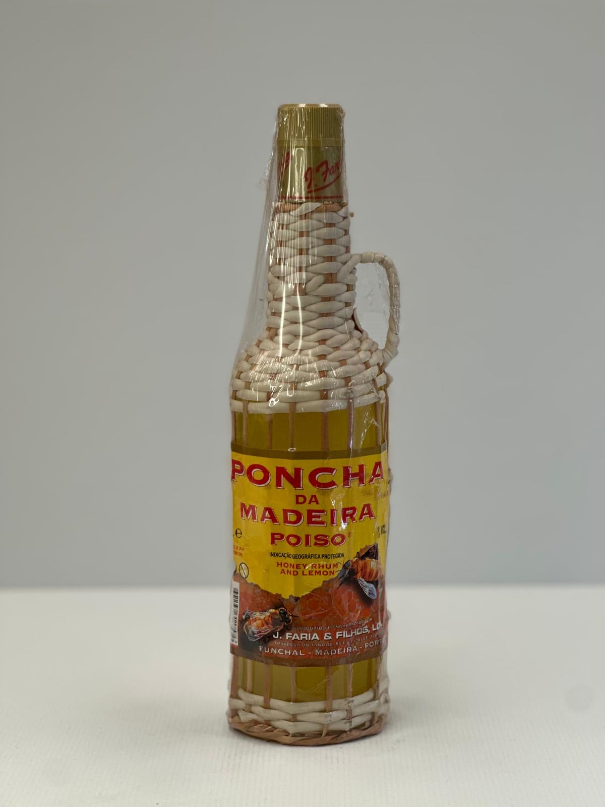 PONCHA POISO EMPALHADA 0.70L